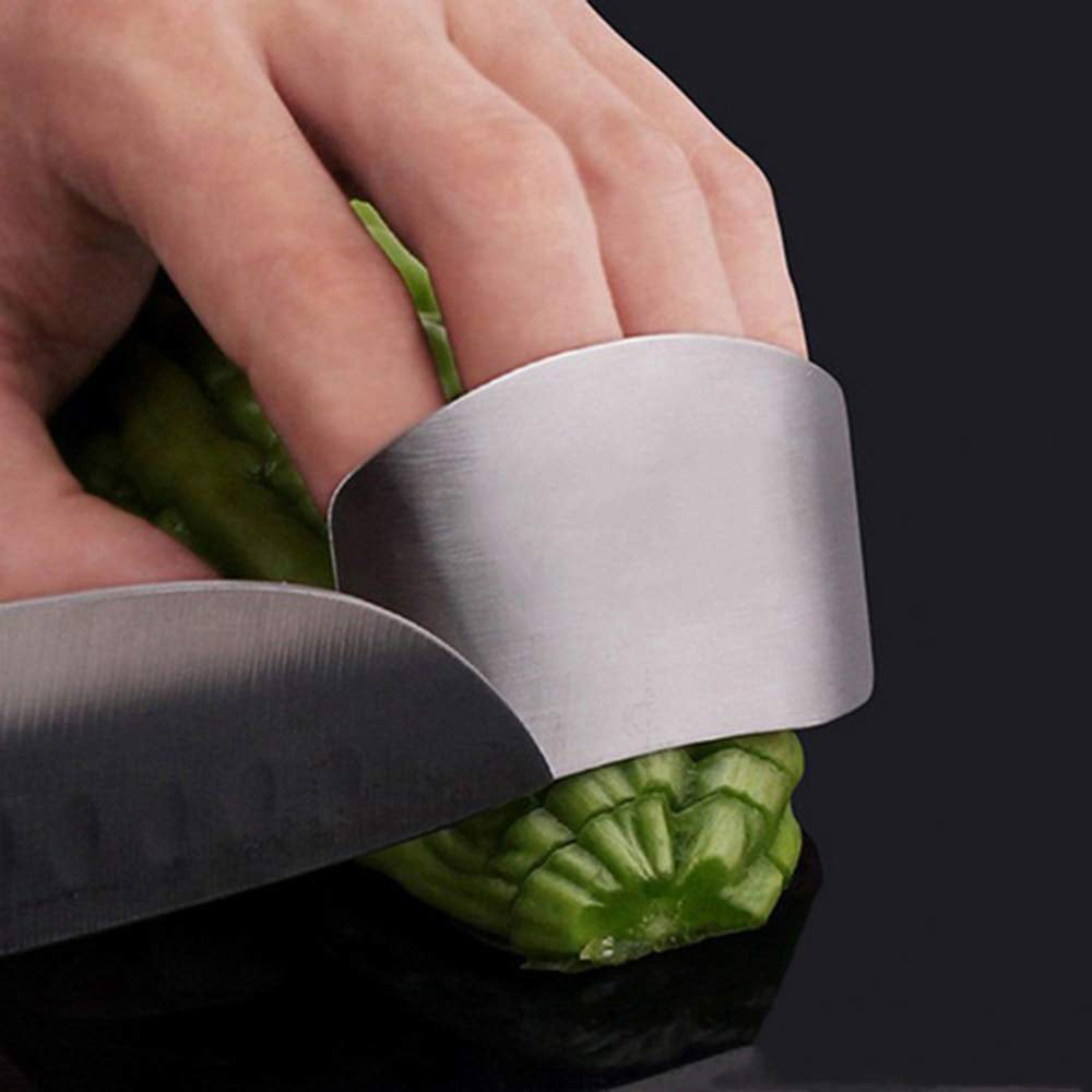 Adjustable stainless steel finger guard for safe slicing. Adjustable stainless steel finger guard for safe slicing.